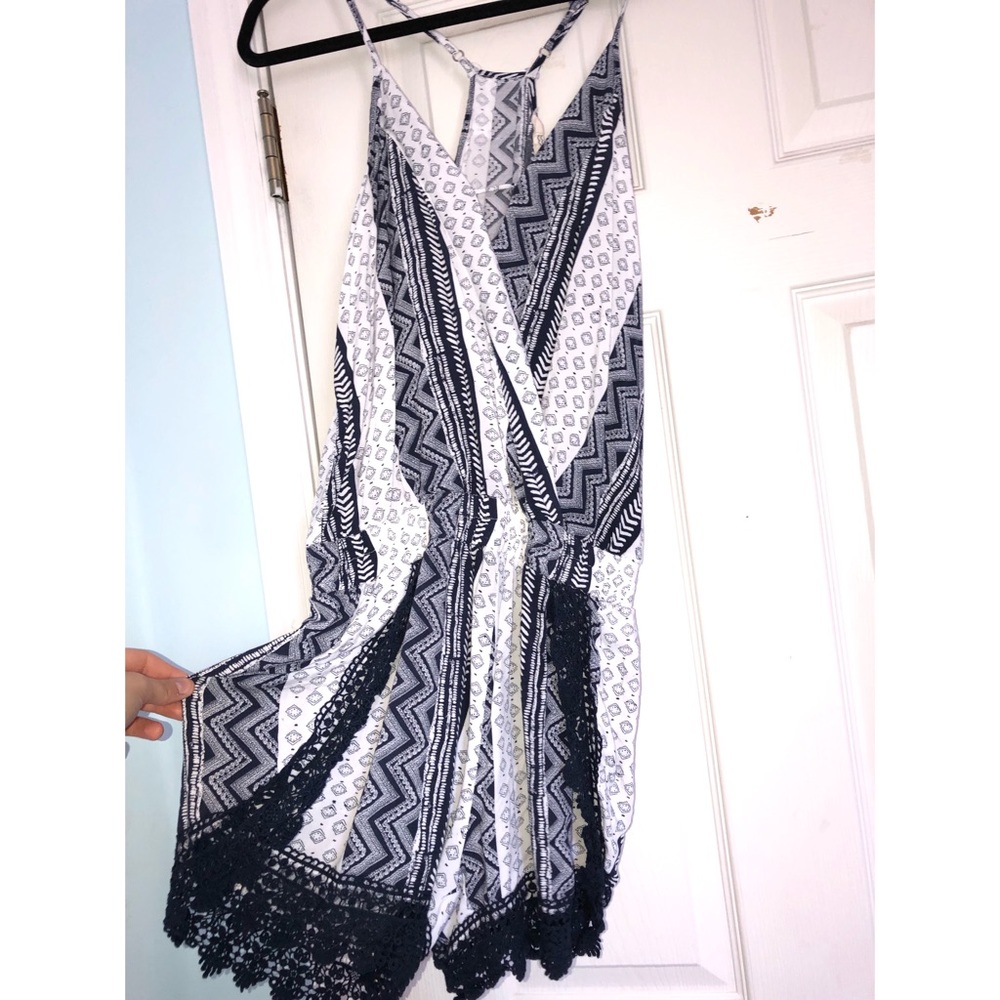 Navy and White romper. Lace hems. Open front